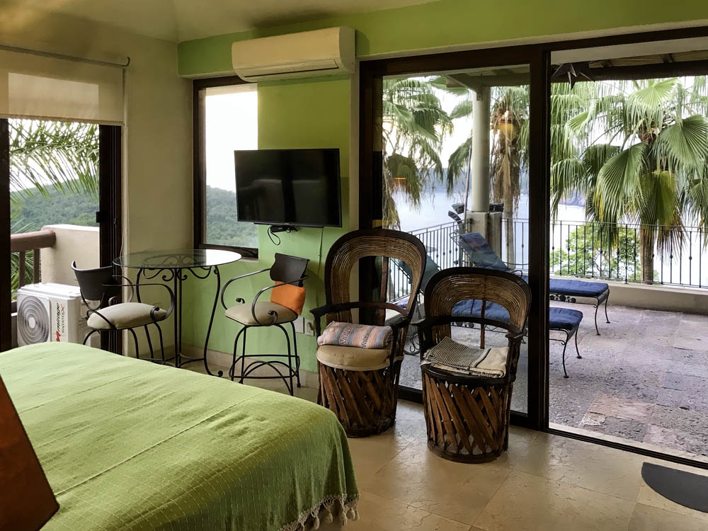 Hammocks, tables and chairs on terrace